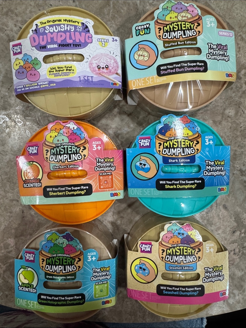 Mystery Dumpling Kids Toy - Assorted Colors (Blue, Orange, Teal, Tan)